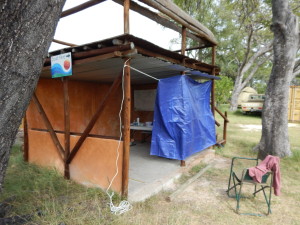 Our outdoor laboratory. We were fortunate to be able to work in this shelter. We added the blue tarp to hold back the wind.